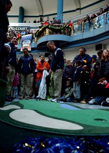 US Navy 091211-N-3857R-002 Midshipmen from the U.S. Naval Academy and Cadets from the U.S. Military Academy participate in the Hole-in-One Challenge