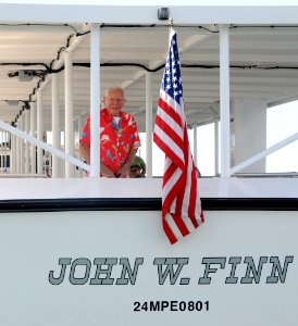 US Navy 091206-N-3666S-038 Retired Lt. John W. Finn takes a ride on the USS Arizona Memorial White Boat John W. Finn, named for him. Finn, the oldest living Medal of Honor recipient, was awarded the Medal of Honor for heroism d