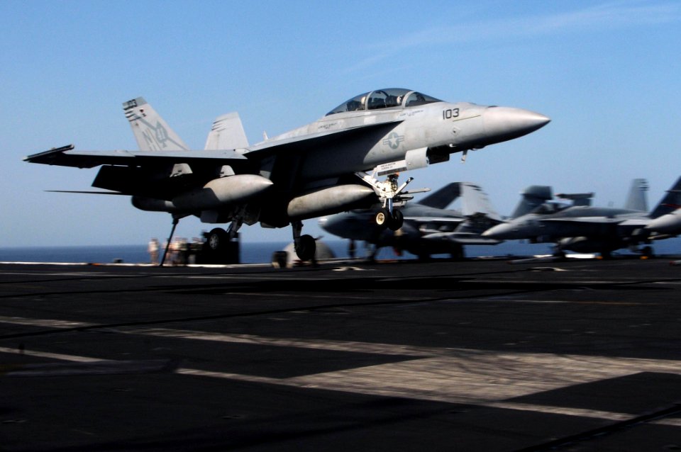US Navy 091207-N-3038W-017 An F-A-18F Super Hornet assigned to the Black Aces of Strike Fighter Squadron (VFA) 41 lands aboard the aircraft carrier USS Nimitz (CVN 68)