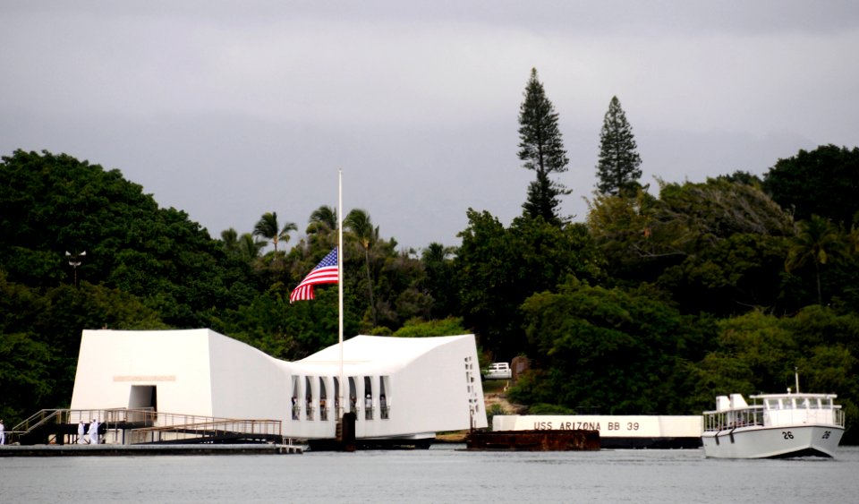 US Navy 091207-N-7498L-563 The Ensign above the USS Arizona Memorial flies half-mast during a National Park Service and U.S. Navy ceremony commemorating the 68th anniversary of the Dec. 7, 1941 surprise attack on Pearl Harbor