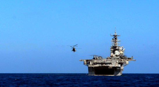 US Navy 091207-N-5148B-095 A CH-46E Sea Knight helicopter assigned to Marine Medium Helicopter Squadron (Reinforced) 166 takes off from the flight deck of the amphibious assault ship USS Bonhomme Richard (LHD 6)