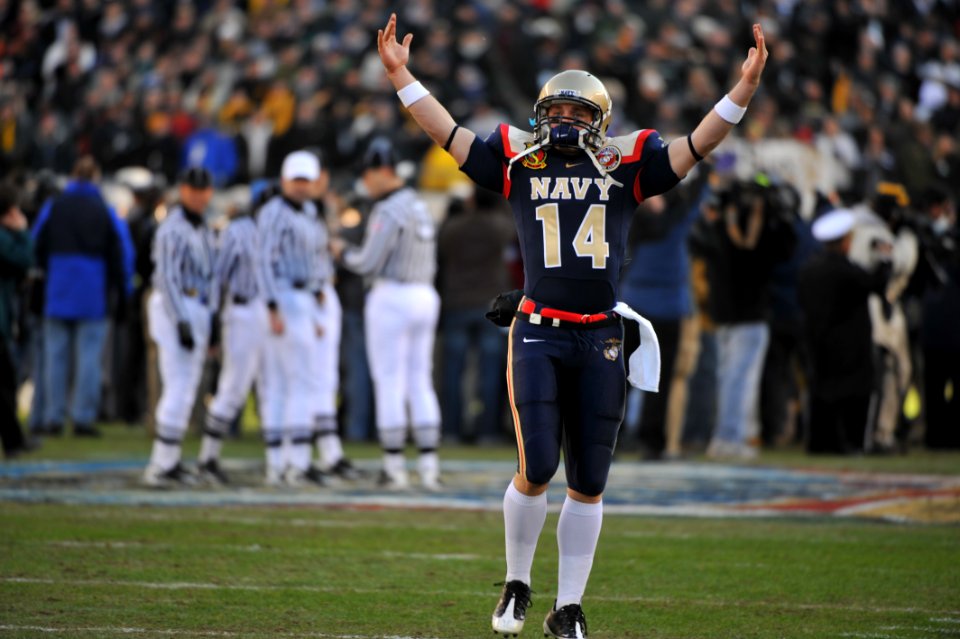 US Navy 091212-N-5319A-132 Navy quarterback Greg Zingler rallies the fans at the beginning of the 110th Army-Navy college football game