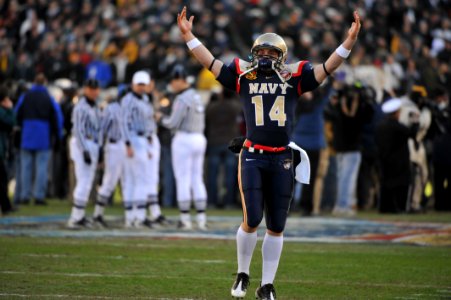 US Navy 091212-N-5319A-132 Navy quarterback Greg Zingler rallies the fans at the beginning of the 110th Army-Navy college football game