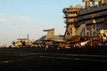 US Navy 091207-N-3038W-331 An F-A-18C Hornet assigned to the Sidewinders of Strike Fighter Squadron (VFA) 86 taxis to the catapult for launch aboard the aircraft carrier USS Nimitz (CVN 68)