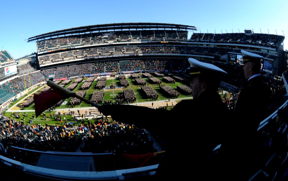 US Navy 091212-N-9693M-044 Midshipman 2nd Class Jason Beasley and Midshipman 1st Class Michael Ross irect the Brigade of Midshipmen as they enter the stadium