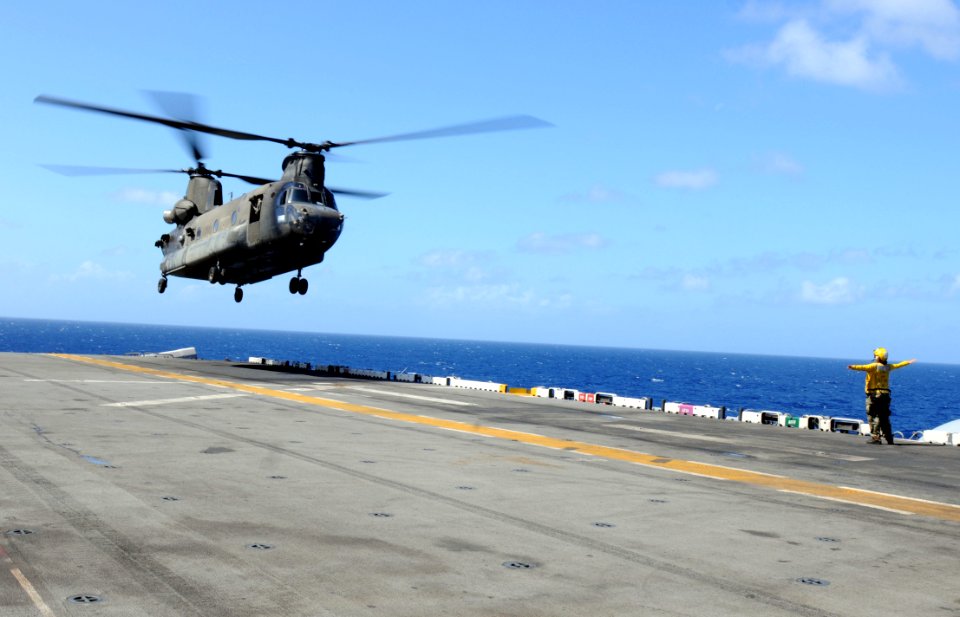 US Navy 091208-N-0890S-037 A CH-47 Chinook helicopter assigned to Joint Task Force-Bravo, headquartered in Honduras, practices deck-landing qualifications aboard the multi-purpose amphibious assault ship USS Wasp (LHD 1)