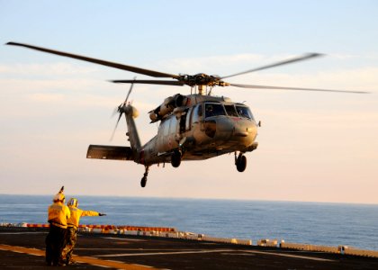 US Navy 091214-N-2735T-076 An MH-60S Sea Hawk helicopter assigned to Helicopter Sea Combat Squadron (HSC) 28 takes off from the USS Nassau