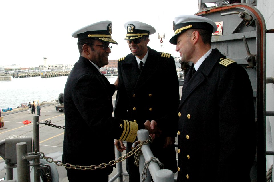 US Navy 091208-N-9806M-107 Vice Adm. Mel Williams Jr., commander of U.S. 2nd Fleet, congratulates Commodore Paul L. McElroy, commander of Amphibious Squadron (PHIBRON) 2, and Capt. Sam Howard