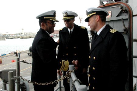 US Navy 091208-N-9806M-107 Vice Adm. Mel Williams Jr., commander of U.S. 2nd Fleet, congratulates Commodore Paul L. McElroy, commander of Amphibious Squadron (PHIBRON) 2, and Capt. Sam Howard