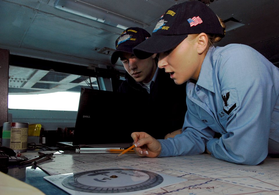 US Navy 091209-N-4954I-024 Quartermaster 3rd Class Jessa Smith, right, from Grants Pass, Ore., trains Quartermaster Seaman Jesse Braman