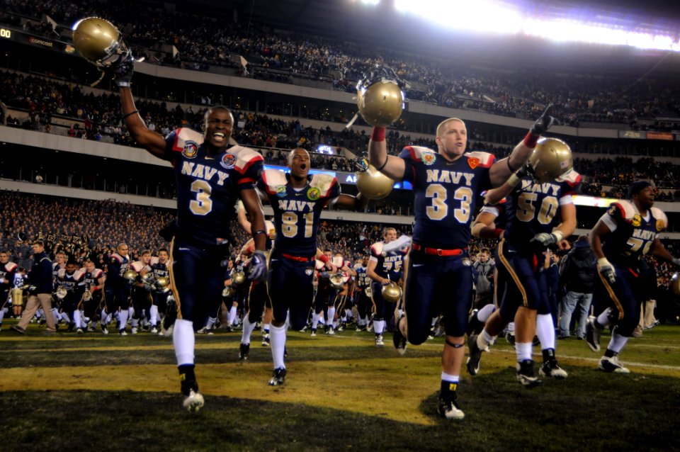 US Navy 091212-N-5319A-586 U.S. Navy Midshipmen celebrate their victory over the U.S. Military Academy after the 110th Army-Navy college football game at Lincoln Financial Field in Philadelphia