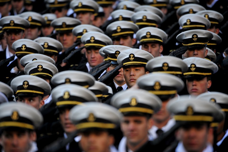 US Navy 091212-N-5319A-131 Navy midshipmen render honors during National Anthem at the beginning of the 110th Army-Navy college football game