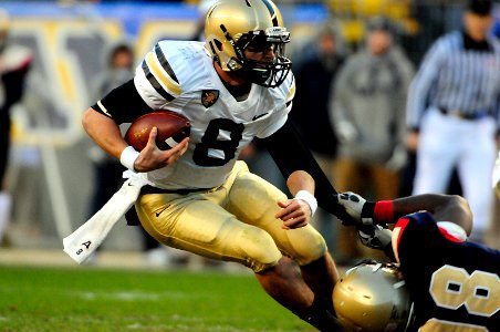 US Navy 091212-N-9693M-693 Army quarterback Trent Steelman (^8) is sacked by Navy defensive end Jabaree Tuani (^98) during the second quarter of the 110th Army-Navy college football game at Lincoln Financial Field in Philadelph