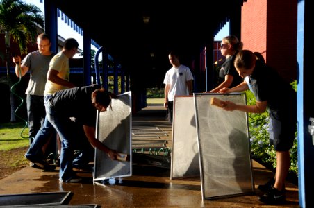 US Navy 091221-N-7498L-002 Service members from the U.S. Navy and U.S. Air Force join in a community service project at Aliamanu Middle School, photo