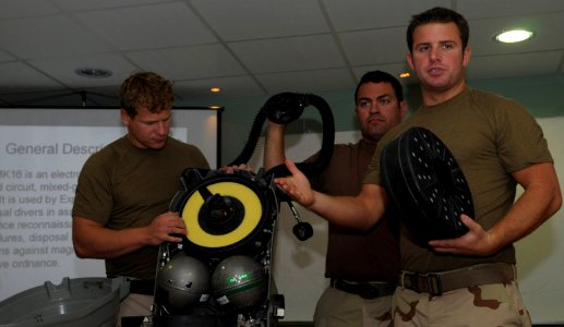 US Navy 100106-N-0260R-062 Sailors explain diving equipment during a class on EOD techniques
