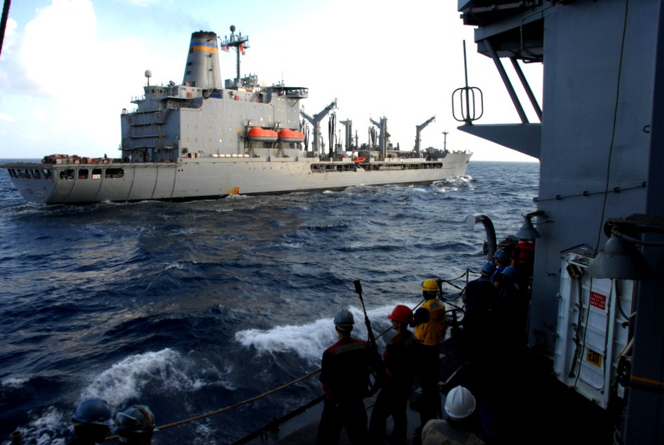 US Navy 100105-N-2600H-014 Sailors aboard USS Chosin (CG 65) stand by as USNS Kanawha (T-AO 196) approaches for a replenishment at sea