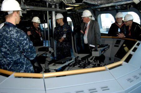 US Navy 091221-N-4482V-005 Rear Adm. Joseph Kilkenny, commander of Naval Education and Training, and his senior staff, listen to Lt. j.g. Justin Guernsey explain the operation of the control panel