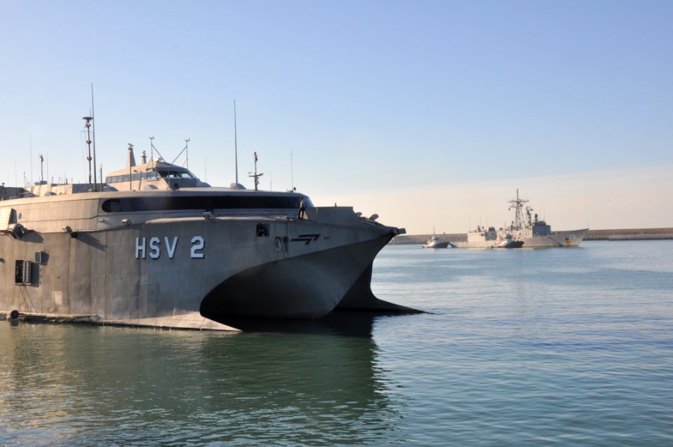 US Navy 091215-N-1825E-378 The High Speed Vessel Swift (HSV) 2, left, is at Naval Station Rota as the guided-missile frigate USS Stephen W. Groves (FFG-29) arrives for a scheduled fuel stop