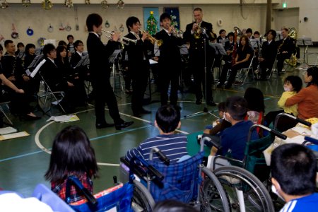US Navy 091218-N-9123L-033 Chief Musician Jason Gromacki, from Encino, Calif., plays trumpet with local Tokyo musicians at the Kanagawa Children's Medical Center photo