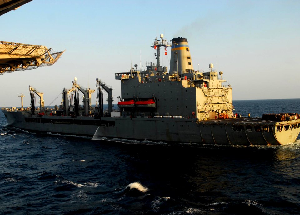 US Navy 091231-N-5148B-008 The Military Sealift Command fleet replenishment oiler USNS Pecos (T-AOE 197) is underway alongside the amphibious assault ship USS Bonhomme Richard (LHD 6) during an underway replenishment on New Yea