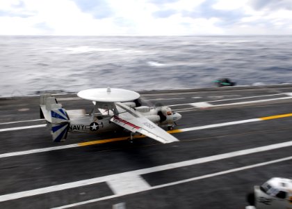 US Navy 100103-N-4236E-057 An E-2C Hawkeye assigned to the Bluetails of Airborne Early Warning Squadron (VAW) 121 conducts a touch and go landing aboard the Nimitz-class aircraft carrier USS Dwight D. Eisenhower (CVN 69)