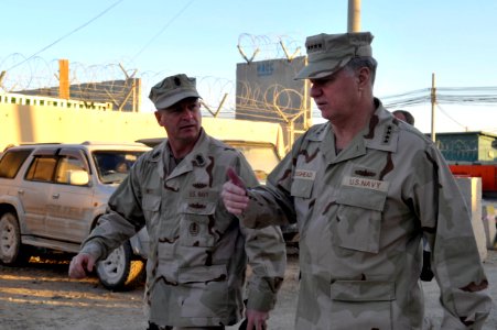 US Navy 100109-N-8273J-012 Master Chief Petty Officer of the Navy (MCPON) Rick West, left, speaks with Chief of Naval Operations (CNO) Adm. Gary Roughead while visiting with Sailors at Kandahar Airfield, Afghanistan photo