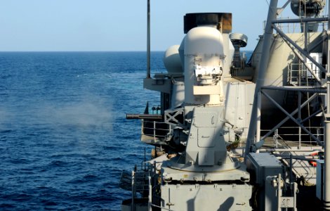 US Navy 091227-N-1291E-121 The close-in weapons system (CWIS) fired from the deck of the guided-missile cruiser USS Chosin (CG 65) during a training exercise