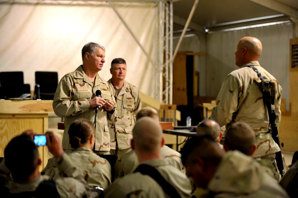 US Navy 100109-N-8273J-080 Chief of Naval Operations (CNO) Adm. Gary Roughead and Master Chief Petty Officer of the Navy (MCPON) Rick West speak with and answer questions from Sailors