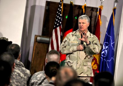 US Navy 100107-N-8273J-228 Chief of Naval Operations (CNO) Adm. Gary Roughead speaks with and answers questions from International Security Assistance Force (ISAF) Sailors while visiting Camp Eggers in Kabul, Afghanistan photo