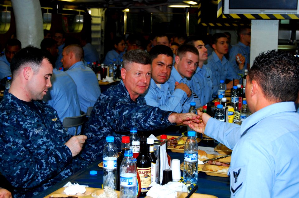 US Navy 100106-N-3589B-042(1) Master Chief Petty Officer of the Navy (MCPON) Richard West has dinner with Sailors aboard USS Nimitz (CVN 68)