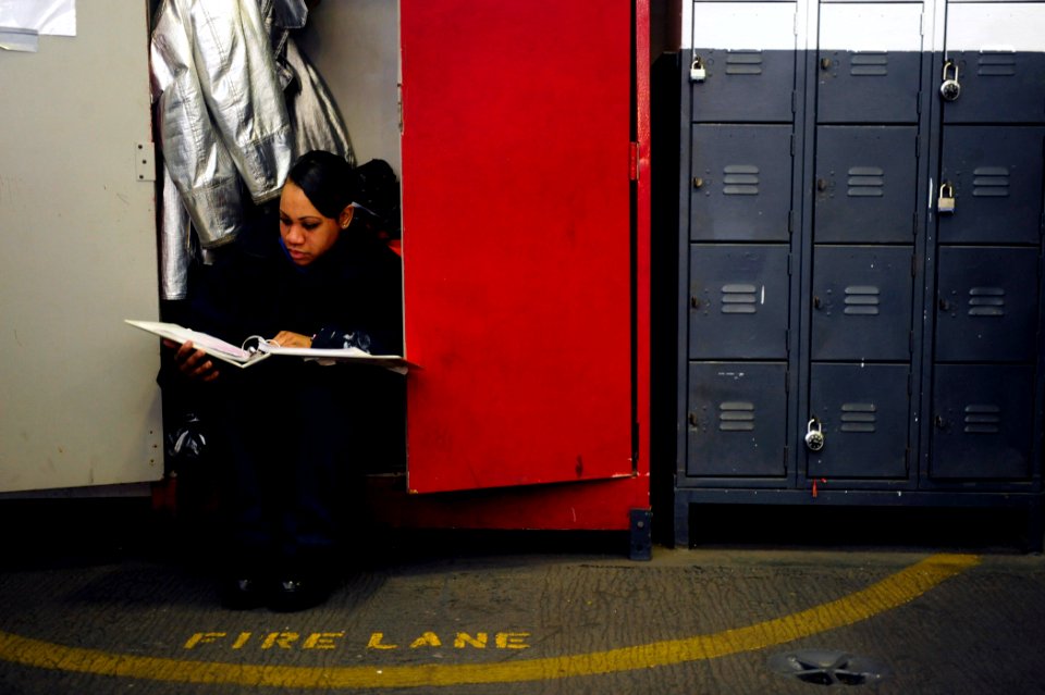 US Navy 100106-6604E-N-166 Aviation Boatswain's Mate Airman Apprentice Lauren Burleigh studies for an upcoming advancement exam