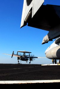 US Navy 100113-N-3327M-024 An E-2C Hawkeye assigned to the Wallbangers of Carrier Airborne Early Warning Squadron (VAW) 117 lands aboard the aircraft carrier USS Nimitz (CVN 68)