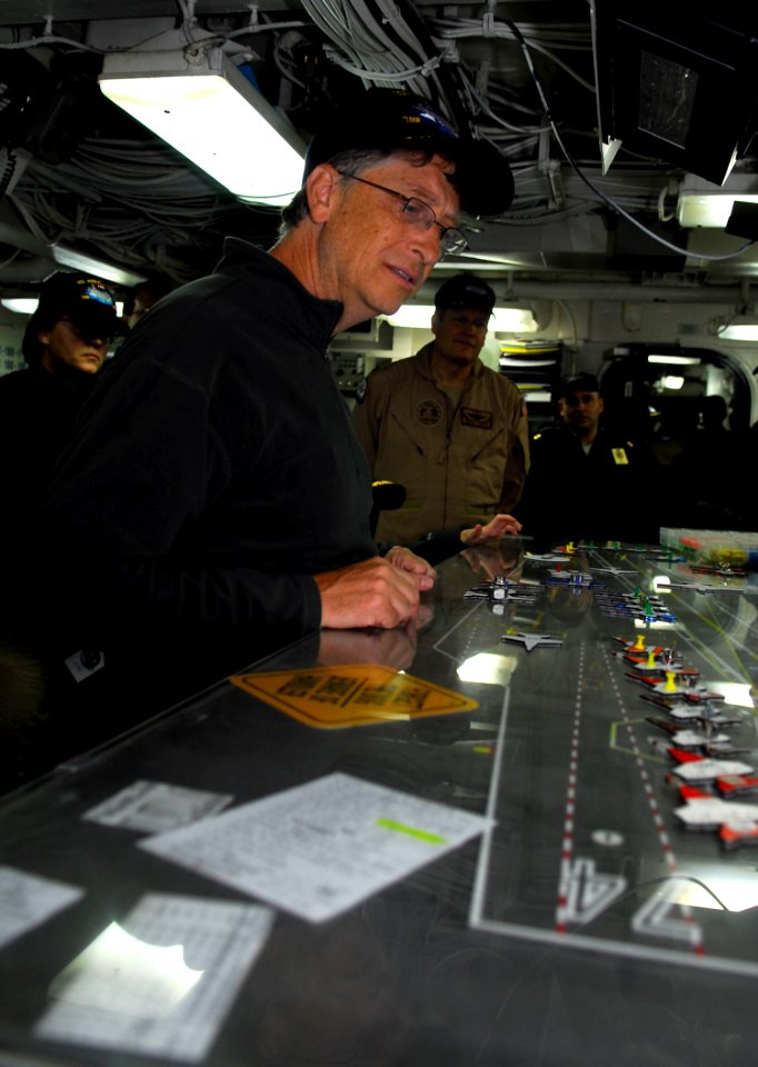 US Navy 100108-N-2475A-037 Bill Gates, Microsoft Corporation chairman and founder, looks at the Ouija board in flight deck control aboard the Nimitz-class aircraft carrier USS John C. Stennis (CVN 74)
