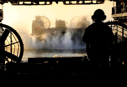 US Navy 100114-N-5345W-095 A landing craft air cushion prepares to enter the well deck of USS Bataan (LHD 5)
