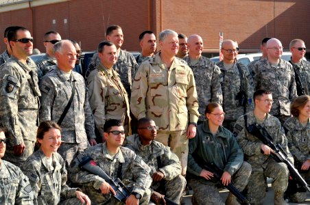 US Navy 100107-N-8273J-081 Chief of Naval Operations (CNO) Adm. Gary Roughead, center, poses for a photo with Sailors assigned to the International Security Assistance Force (ISAF) Joint Command photo