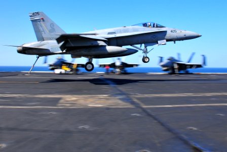 US Navy 100110-N-7939W-356 An F-A-18C Hornet lands aboard USS Nimitz (CVN 68)