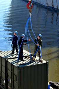 US Navy 100114-N-4267W-063 Sailors load MSRON-6 equipment before deploying to Haiti to assist with humanitarian relief efforts