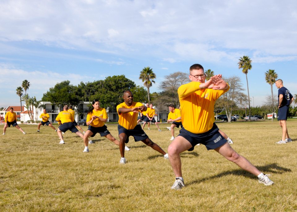 US Navy 100112-N-4044H-021 ailors competing for Sailor of the Year at Commander Fleet Logistics Wing, stretch before group physical training