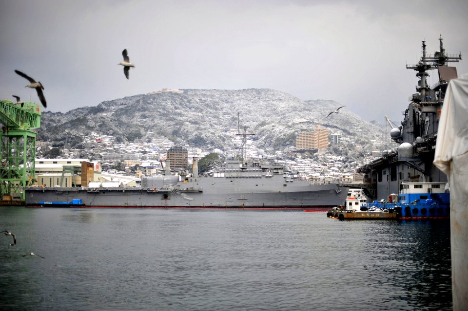 US Navy 100113-N-0807W-033 The amphibious transport dock ship USS Denver (LPD 9) rests in her berth at Fleet Activities Sasebo as snow falls over Japan's Kyushu region