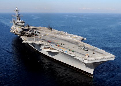 US Navy 100115-N-6247V-553 The Nimitz-class aircraft carrier USS Carl Vinson (CVN 70) awaits the return of Carrier Air Wing (CAG) 17 aircraft along the coast of Haiti