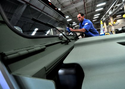 US Navy 100114-N-7367K-001 Bill Johnson prepares a medium tactical vehicle replacement tractor for mobilization to Haiti with Naval Mobile Construction Battalion (NMCB) 7