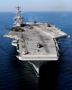 US Navy 100115-N-6247V-551 The Nimitz-class aircraft carrier USS Carl Vinson (CVN 70) awaits the return of Carrier Air Wing (CAG) 17 aircraft along the coast of Haiti