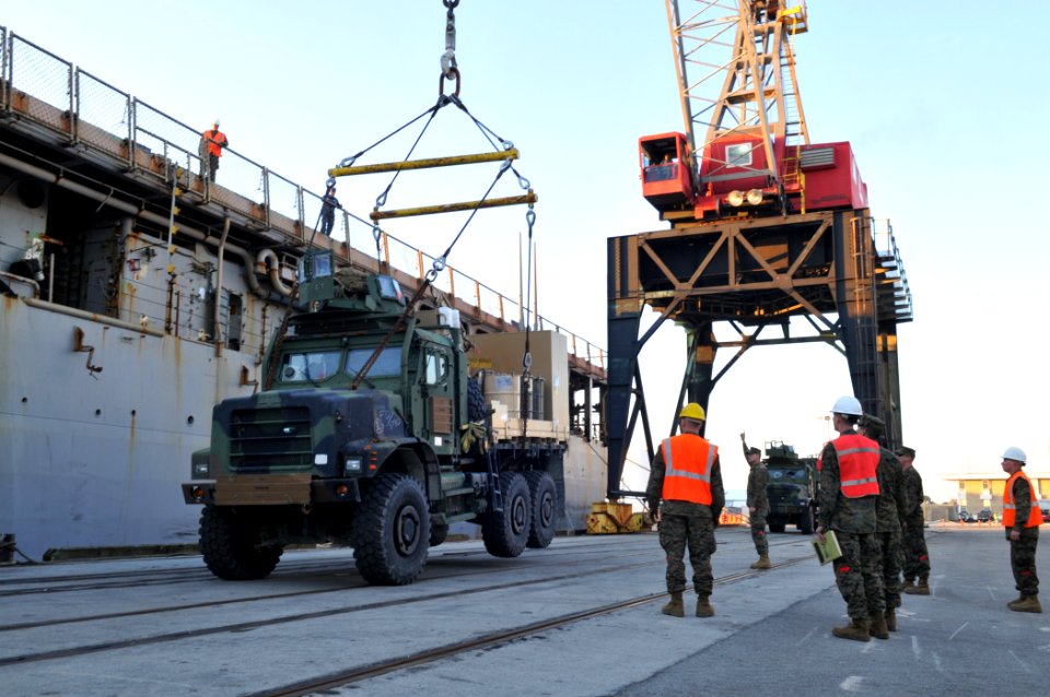 US Navy 100115-N-1831S-073 Marines load supplies aboard USS Bataan (LHD 5)