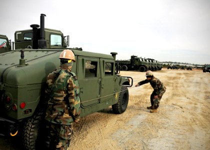 US Navy 100115-N-6889J-002 eabees assigned to Naval Mobile Construction Battalion (NMCB) 7 conduct weights and balances at Naval Construction Battalion Center Gulfport to deploy the unit air detachment to assist with relief eff