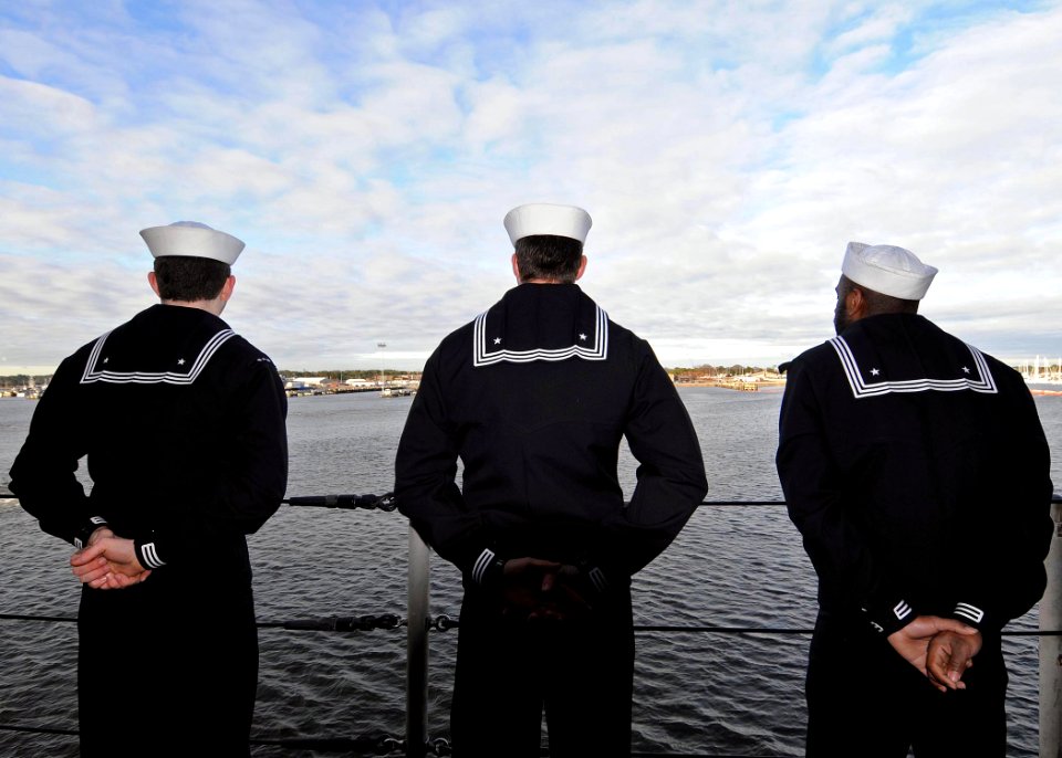 US Navy 100118-N-1082Z-020 Sailors man the rails aboard the amphibious dock landing ship USS Ashland (LSD 48) as the ship departs Joint Expeditionary Base Little Creek-Fort Story