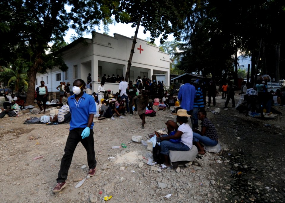 US Navy 100116-N-2953W-275 Patients affected by the recent earthquake wait outside the Killick Haitian Coast Guard base clinic to receive treatment from U.S. Navy and U.S. Coast Guard medical workers