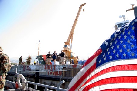 US Navy 100118-N-1134L-261 Members of a U.S. Navy and Army joint-service dive task force conduct an assessment of port facilities during an inspection of the port in Port-au-Prince, Haiti