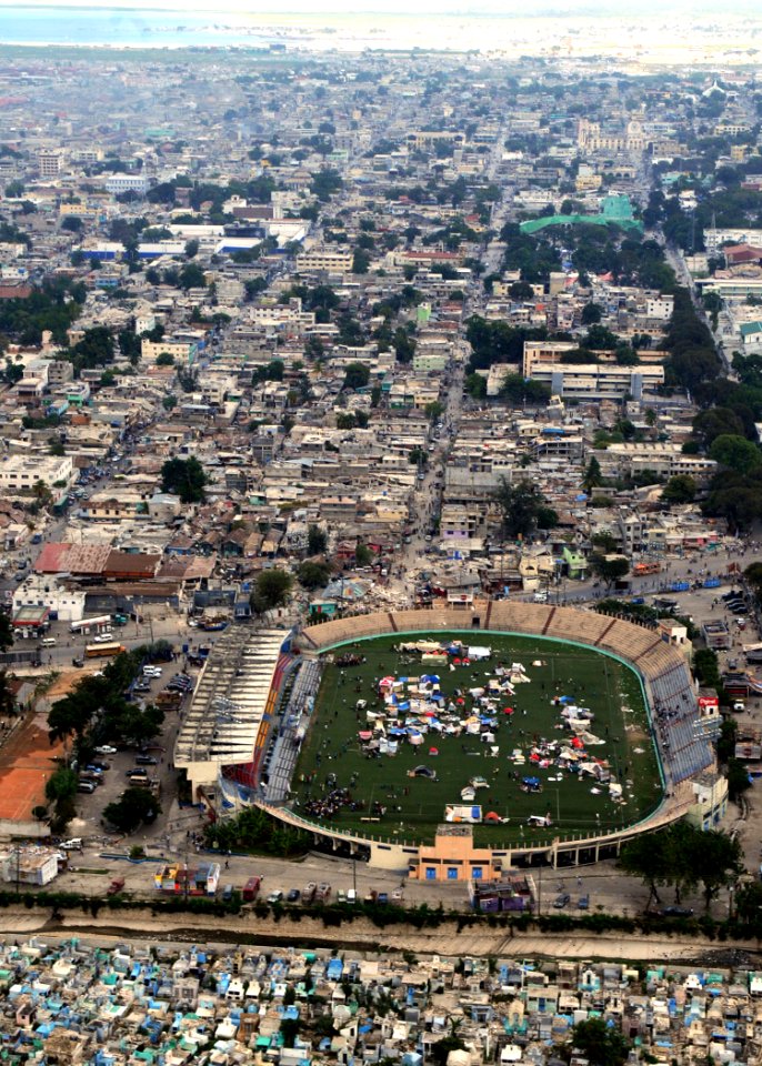 US Navy 100117-N-4275C-190 Haitian citizens seek refuge at the Stade Sylvio Cator, the national soccer stadium, in Port-au-Prince, Haiti