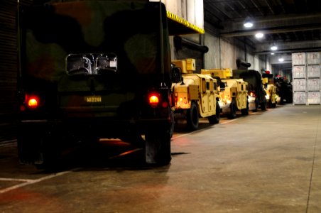US Navy 100116-N-1092P-065 Vehicles from the 22nd Marine Expeditionary Unit (22nd MEU) line up before driving onto the multi-purpose amphibious assault ship