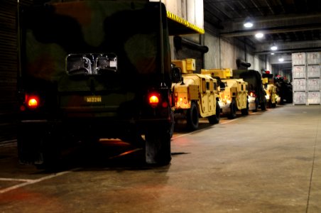 US Navy 100116-N-1092P-065 Vehicles from the 22nd Marine Expeditionary Unit (22nd MEU) line up before driving onto the multi-purpose amphibious assault ship photo